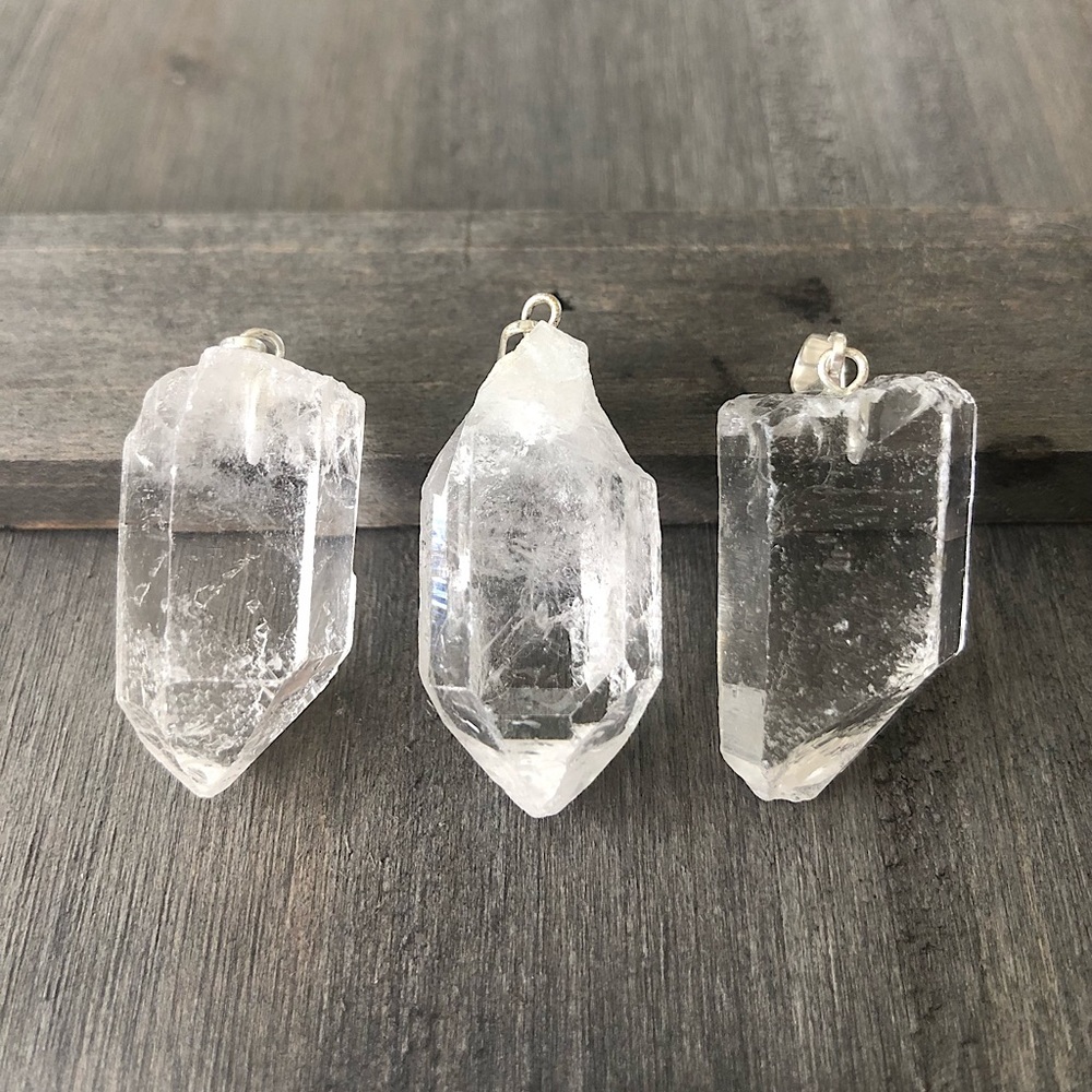 Raw clear quartz crystal pendant